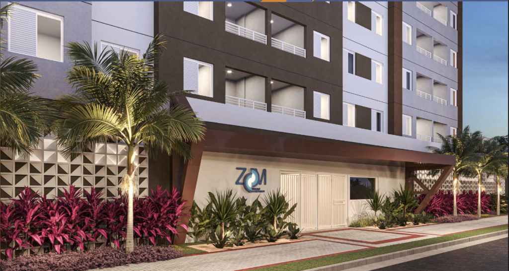 Fachada do empreendimento Zoom Parque Ecológico com entrada e paisagismo